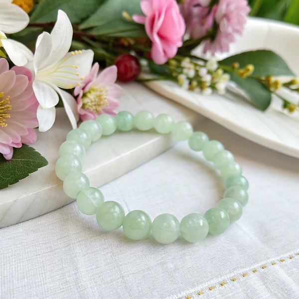 Green Opal Bracelet Green opal beaded bracelet showing natural color variations and healing properties