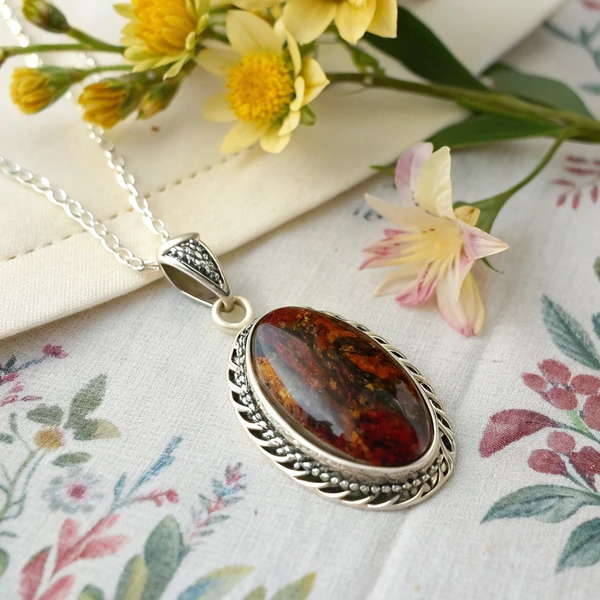 Pietersite Pendant Necklace Pietersite pendant necklace set in sterling silver displaying swirling tempest patterns