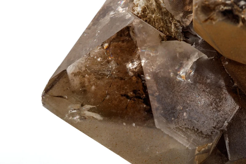 Natural smoky quartz crystal cluster showing multiple points and druzy formation